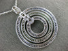 LARGE 4.32CT DIAMOND & AAA SAPPHIRE & TSAVORITE 18KT WHITE GOLD CIRCULAR PENDANT