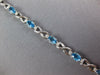 LONG 5.05CT DIAMOND & AAA BLUE TOPAZ 14KT WHITE GOLD OVAL X LOVE TENNIS BRACELET