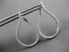 ESTATE LARGE 1.25CT DIAMOND 18KT WHITE GOLD TEAR DROP SIDEWAYS HANGING EARRINGS