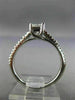 ESTATE .66CT ROUND & PRINCESS DIAMOND 14KT WHITE GOLD SOLITAIRE ENGAGEMENT RING