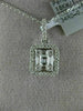 .49CT DIAMOND 18KT WHITE GOLD 3D ROUND & BAGUETTE SQUARE OCTAGON CLUSTER PENDANT