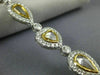 LARGE 13.95CT WHITE & FANCY YELLOW DIAMOND 18KT TWO TONE GOLD 3D TENNIS BRACELET