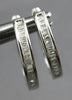 ESTATE .20CT DIAMOND 14KT WHITE GOLD 3D BAGUETTE CHANNEL OVAL HANGING EARRINGS