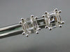ESTATE .49CT DIAMOND 18KT WHITE GOLD 3D BAGUETTE OCTAGON INVISIBLE STUD EARRINGS