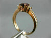1.40CT ROUND DIAMOND & OVAL RHODOLITE 14KT ROSE GOLD THREE STONE ENGAGEMENT RING