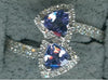 .80CT DIAMOND & AAA TANZANITE 14KT WHITE GOLD TRILLION & ROUND CRISS CROSS RING