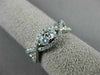 ESTATE .54CT DIAMOND 14KT WHITE GOLD 3D TWO STONE CRISS CROSS INFINITY LOVE RING