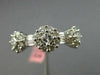 ESTATE .85CT ROUND & BAGUETTE DIAMOND 18KT WHITE GOLD 3 FLOWER ANNIVERSARY RING