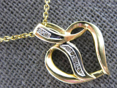 .05CT DIAMOND 14KT 2 TONE GOLD 3D ROUND CRISS CROSS HEART SHAPE FLOATING PENDANT