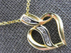 .05CT DIAMOND 14KT 2 TONE GOLD 3D ROUND CRISS CROSS HEART SHAPE FLOATING PENDANT