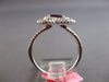 1.83CT DIAMOND & AAA RUBY 18KT WHITE GOLD OVAL & ROUND 4 LEAF CLOVER FLOWER RING