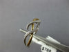 ESTATE .06CT DIAMOND 14KT WHITE AND YELLOW GOLD 3D CLASSIC INFINITY LOVE RING