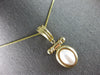 ESTATE LARGE AAA MOTHER OF PEARL 14KT YELLOW GOLD OVAL ENHANCER FLOATING PENDANT