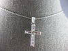 ESTATE .50CT DIAMOND 14KT WHITE GOLD 3D CLASSIC ROUND & BAGUETTE CROSS PENDANT