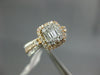 .82CT DIAMOND 14KT WHITE & ROSE GOLD 3D ROUND & BAGUETTE HALO ENGAGEMENT RING