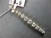 ESTATE .77CT DIAMOND 14KT YELLOW GOLD JOURNEY SHARED PRONG BAR FLOATING PENDANT