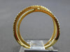 ESTATE .22CT DIAMOND 18KT YELLOW GOLD 3D ROUND CRISS CROSS INFINITY LOVE RING