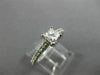 ESTATE .66CT ROUND & PRINCESS DIAMOND 14KT WHITE GOLD SOLITAIRE ENGAGEMENT RING