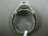 ESTATE .59CT WHITE & BLUE DIAMOND 14KT WHITE GOLD SOLITAIRE HALO ENGAGEMENT RING