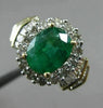 ESTATE 1.82CT ROUND & BAGUETTE DIAMOND & AAA EMERALD 14K TWO TONE GOLD HALO RING