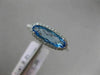 ESTATE 1.56CT DIAMOND & AAA OVAL BLUE TOPAZ 14KT WHITE GOLD HALO FILIGREE RING