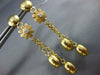 LARGE .05CT DIAMOND 18KT YELLOW GOLD 3D MATTE AND SHINY FLOWER HANGING EARRINGS