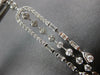 LONG 1.25CT DIAMOND 14KT WHITE GOLD ROUND & BAGUETTE HORSESHOE HANGING EARRINGS