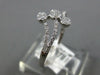 ESTATE .16CT DIAMOND 14KT WHITE GOLD 3D CLASSIC FLOWER CRISS CROSS LOVE RING