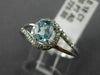 ESTATE .48CT DIAMOND & AAA OVAL CUT AQUAMARINE 14KT WHITE GOLD 3D LOVE KNOT RING