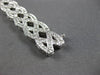 WIDE 4.20CT DIAMOND 14KT WHITE GOLD ROUND CRISS CROSS INFINITY TENNIS BRACELET