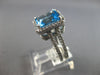 6.40CT DIAMOND & AAA BLUE TOPAZ 14KT WHITE GOLD 3D EMERALD CUT & ROUND HALO RING