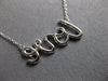 ESTATE .30CT DIAMOND 18KT WHITE GOLD 3D CLASSIC LOVE SCRIPT NECKLACE