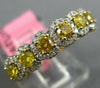 ESTATE .96CT WHITE & FANCY YELLOW DIAMOND 18KT YELLOW GOLD HALO ANNIVERSARY RING