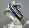 1.49CT DIAMOND & AAA SAPPHIRE 14KT WHITE GOLD 3D ROUND & BAGUETTE LOVE KNOT RING