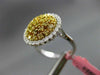 ESTATE LARGE 1.09CT DIAMOND 18KT WHITE & YELLOW GOLD HALO CIRCULAR COCKTAIL RING