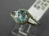 ESTATE .48CT DIAMOND & AAA OVAL CUT AQUAMARINE 14KT WHITE GOLD 3D LOVE KNOT RING