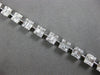 3.90CT DIAMOND 18KT WHITE GOLD 3D ROUND & BAGUETTE MULTI SQUARE TENNIS BRACELET