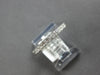 ESTATE .60CT DIAMOND 18KT WHITE GOLD PRINCESS CHANNEL INVISIBLE ANNIVERSARY RING