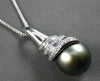 LARGE .07CT DIAMOND & AAA TAHITIAN PEARL 14KT WHITE GOLD SWIRL FLOATING PENDANT