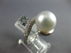 LARGE .48CT DIAMOND & AAA SOUTH SEA PEARL 18KT WHITE GOLD CRISS CROSS SWIRL RING