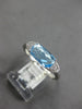 ESTATE 1.22CT DIAMOND & AAA BLUE TOPAZ 14KT WHITE GOLD CUSHION & ROUND FUN RING