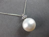 .06CT DIAMOND & AAA SOUTH SEA PEARL 14KT WHITE GOLD FLOWER TRILLION FUN PENDANT