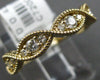 ESTATE .43CT DIAMOND 14KT YELLOW GOLD 3D ROUND CLASSIC INFINITY LOVE RING