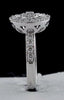 ESTATE 1.11CT DIAMOND 18KT WHITE GOLD ROUND & BAGUETTE CIRCULAR FLOWER LOVE RING