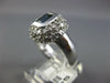 1.66CT DIAMOND & AAA SAPPHIRE 14KT WHITE GOLD EMERALD CUT & ROUND BEZEL FUN RING