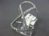 ESTATE LARGE .58CT DIAMOND 18KT WHITE GOLD 3D X LOVE RING