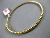 1.1CT INTENSE FANCY YELLOW DIAMOND 18KT YELLOW GOLD SHARED PRONG BANGLE BRACELET