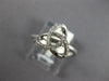 ESTATE .13CT DIAMOND 18KT WHITE GOLD 3D CLASSIC LOVE KNOT FLOWER STAR RING