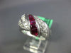 2.70CT DIAMOND & AAA RUBY 18KT WHITE GOLD ROUND & BAGUETTE CRISS CROSS LOVE RING