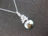 LARGE .07CT DIAMOND & AAA TAHITIAN PEARL 14KT WHITE GOLD SWIRL FLOATING PENDANT